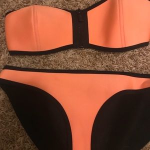 Fluorescent orange triangl suit